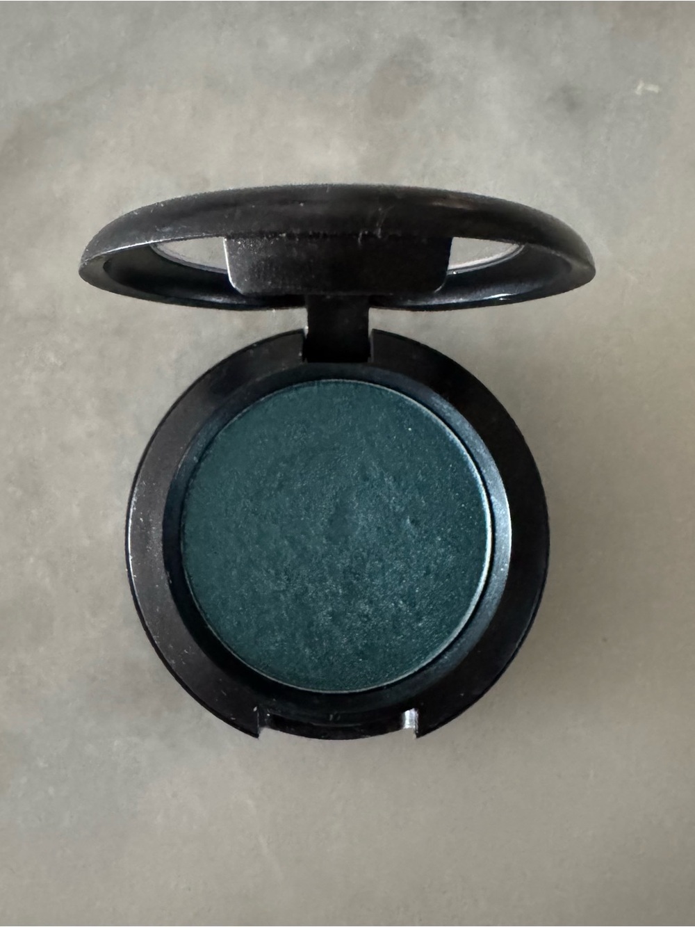 MAC Cosmetics Mineralize Eye Shadow compact, specifically in the shade Opalisque
